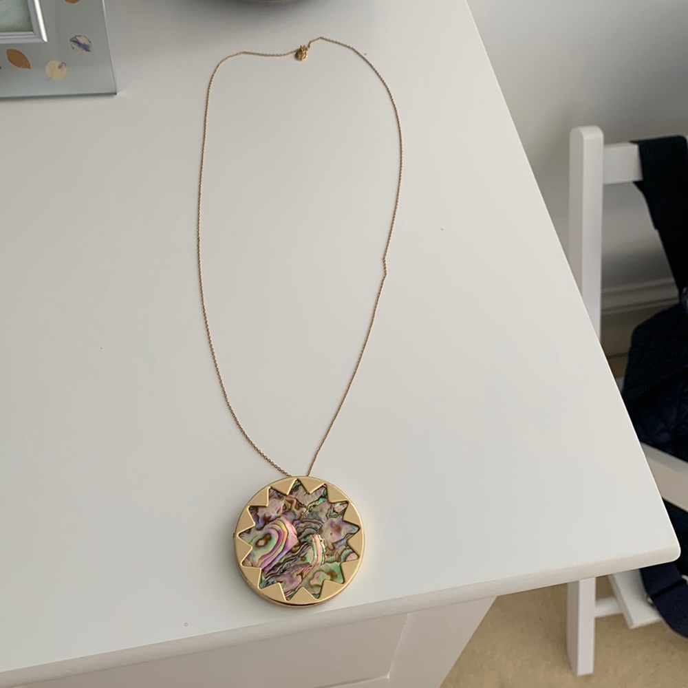 South Moon Under gold long chain starburst design necklace